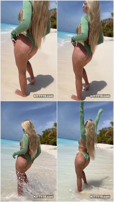 Alinaaignatova ass holds a relaxed pose, full lips and wide eyes set in a soft face, her graceful form outlined with quiet charm.