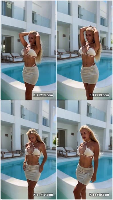 Alinaaignatova nude poses with elegance, her toned waist, natural bust, and calm eyes capturing quiet beauty and sensuality.