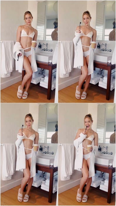 Relaxed and radiant, Olivia Ponton sex models soft white lingerie with a robe, capturing a cozy morning mood.