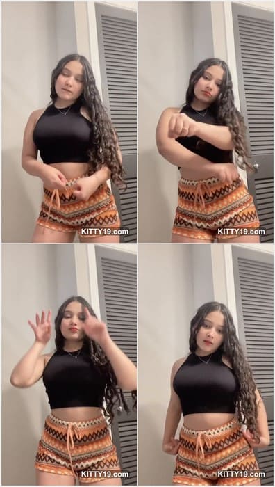 Stefrpp erome dances in a tribal-pattern skirt and black crop top, her long hair flowing as she moves with energy and poise.