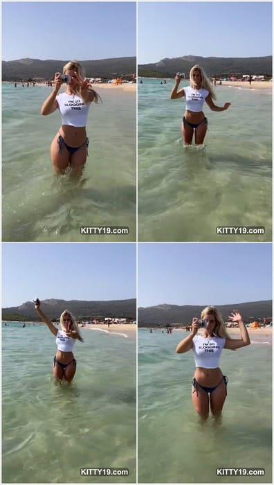 Pale blue eyes framed by golden lashes give Joanna Kuchta bikini a fairytale stare — angelic yet mysteriously edgy.